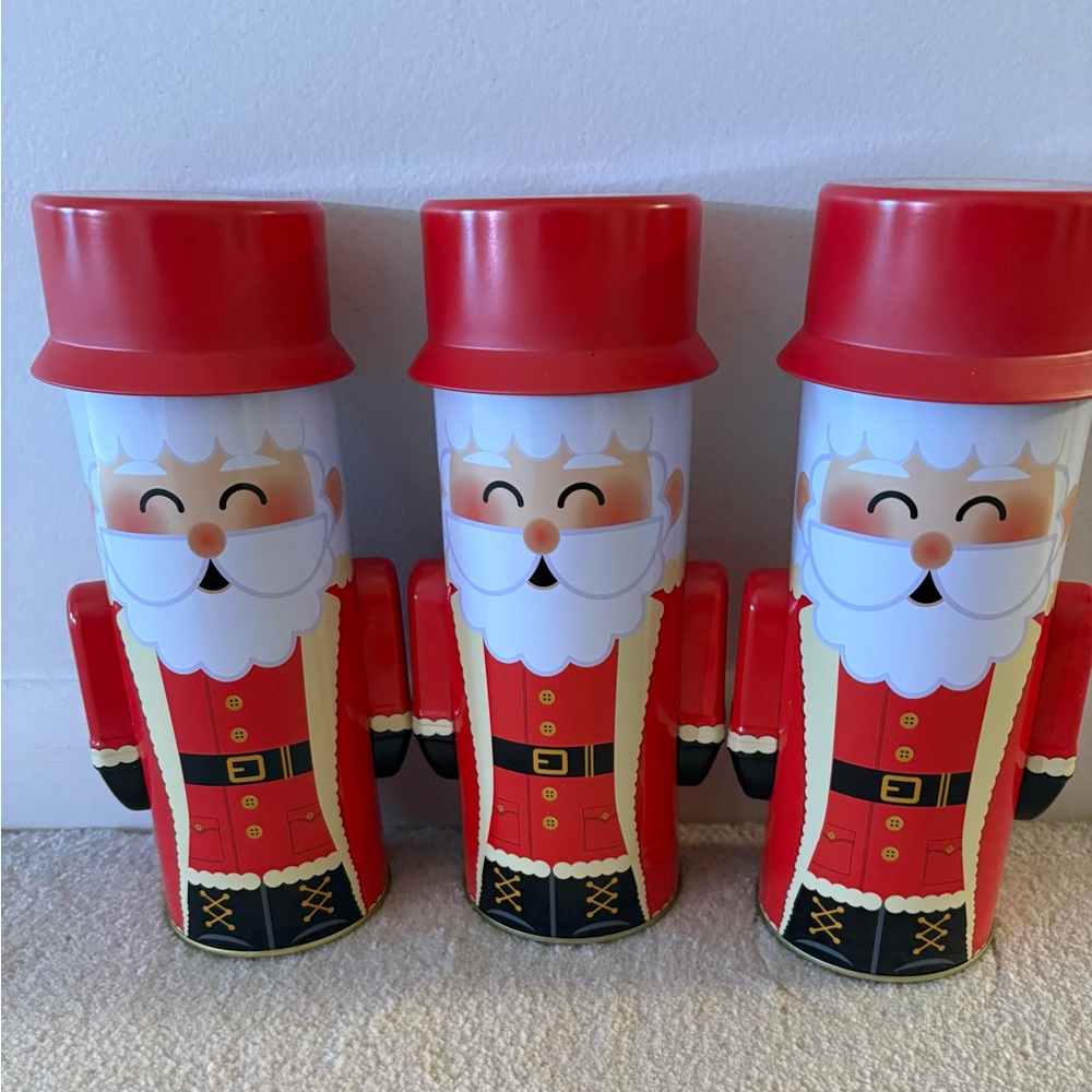 Three Harry & David Metal Santa Claus Canisters with Lids